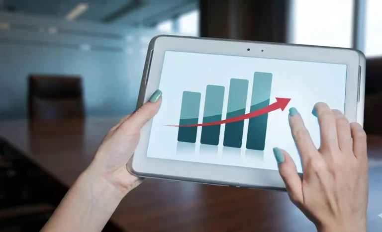 Financial chart on a tablet displaying the impact of delayed or misaligned hiring on business growth and performance.